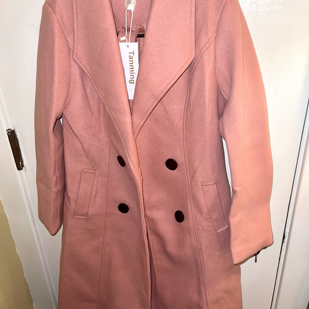 Never worn fashionable pink wool coat.